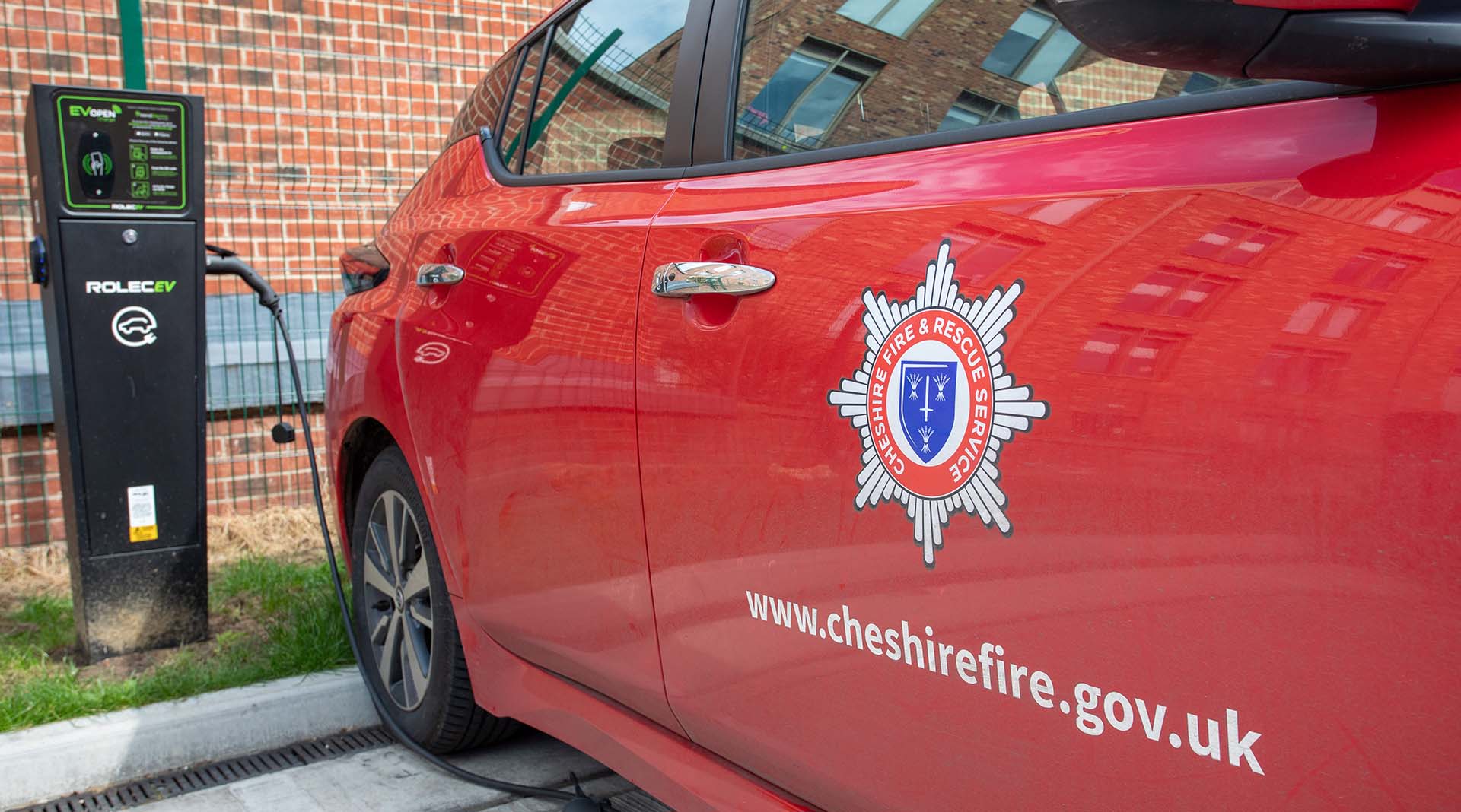 Chester fire and rescue service electric car being charged at  charging point