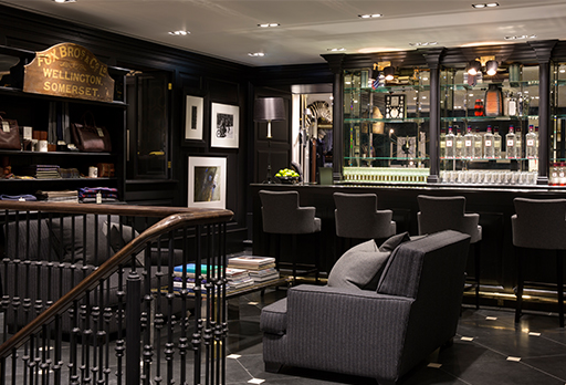 Lounge area and bar at Hackett London UK fit out by ISG