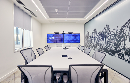 Meeting conference room with office chairs at corporate client fit out by ISG Ltd