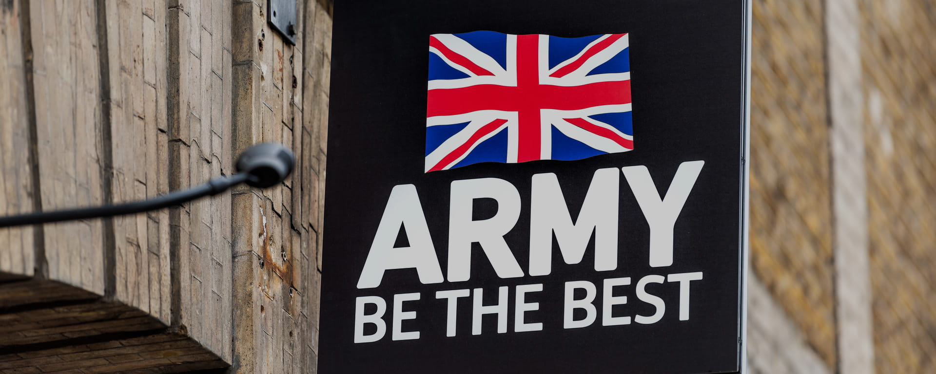 Signage on a wall for UK Army with slogan 'Be the best'