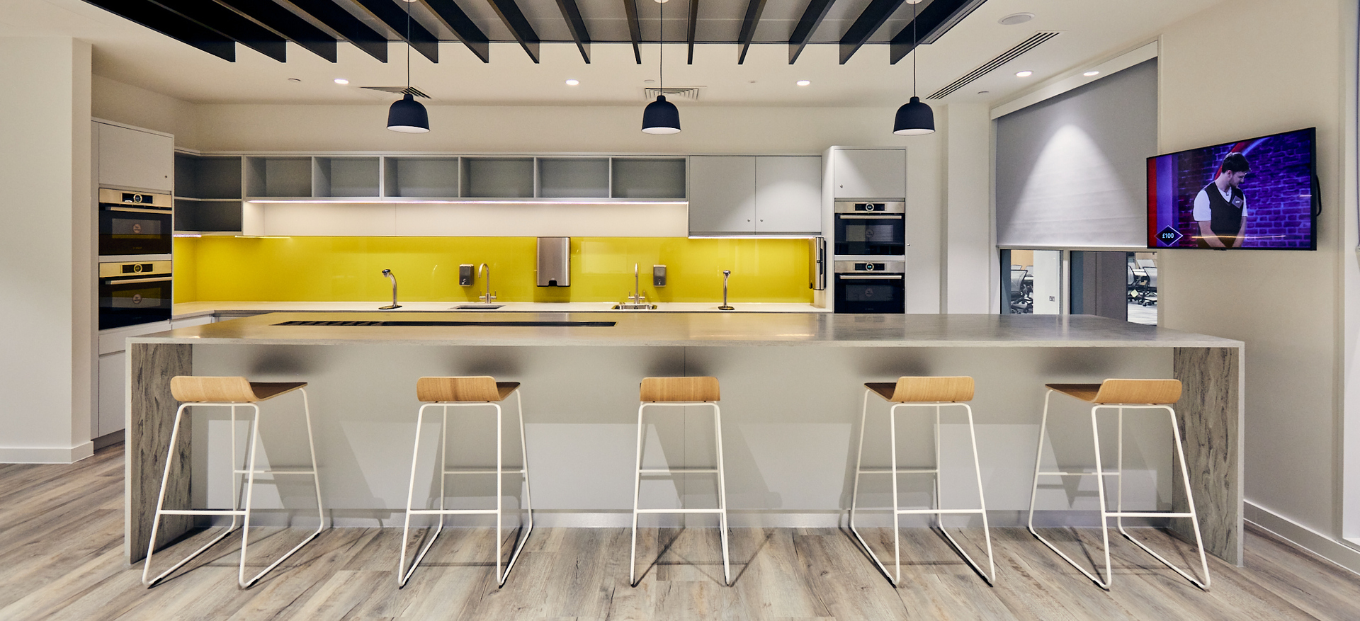 Breakfast bar and kitchen in corporate office fit out by ISG Ltd