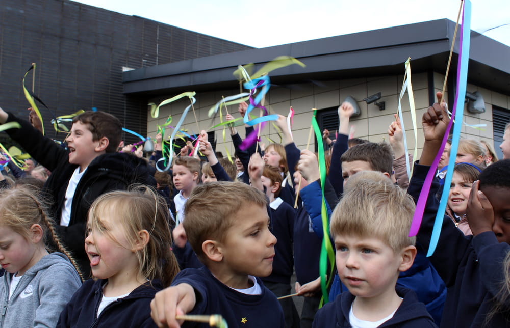 Children celebrate on launch day