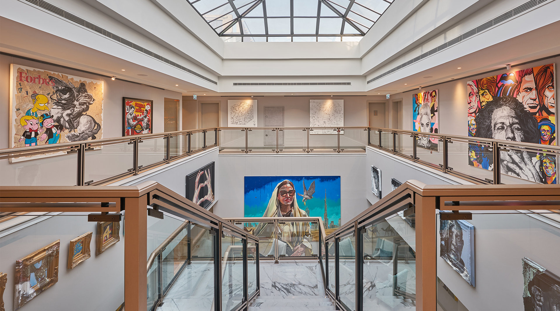 Interior atrium and stairs at a modern art gallery delivered by ISG Construction Ltd