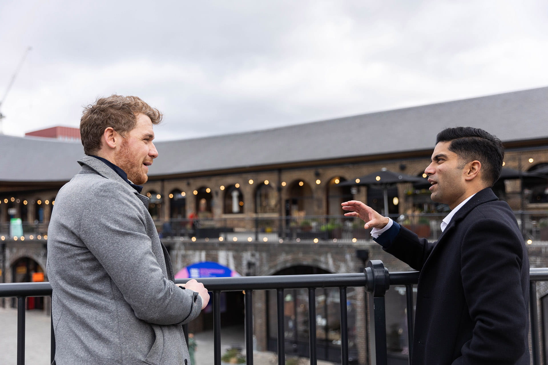 ISG employees Harsha Javvaji and Oliver Day in conversation at Kings cross granary square
