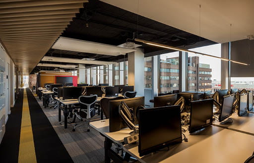 Interior Citrix Systems office refurbishment showing workstations, monitors and open plan office