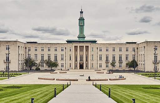Waltham Forest Town Hall and its surrounding grounds. The building sports a unique green clock tower in its centre.